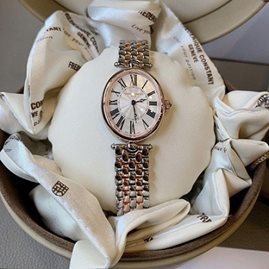 שעון לאישה יוקרתי פרדריק קונסטנט FREDERIQUE CONSTANT FC-200MPW2V2B כסוף מוזהב אובלי לוח לבן